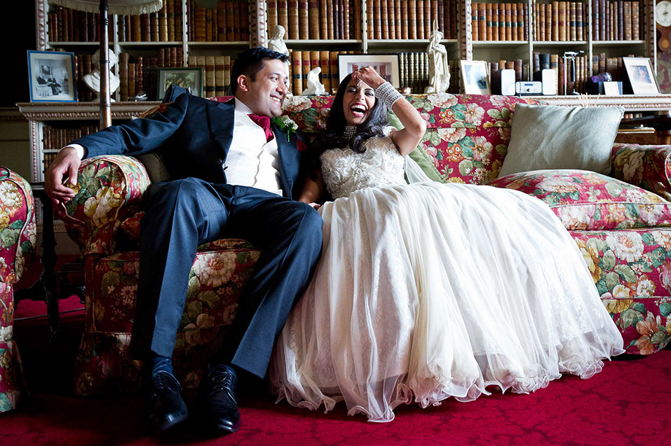 Portrait of a happy newly wed couple at Hagley Hall on their wedding day taken by Natasha Hirst.